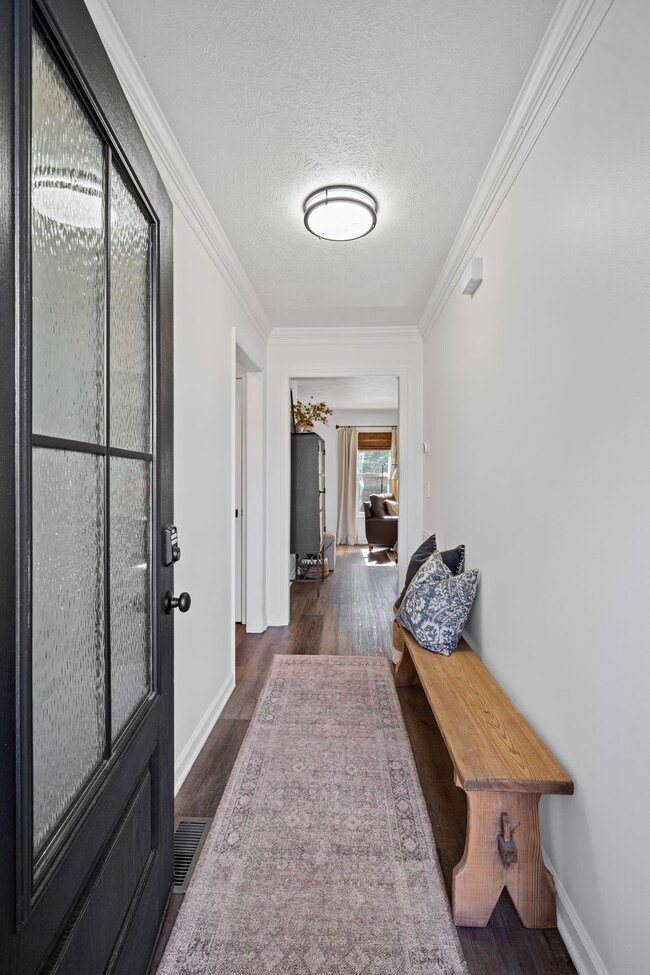 Inviting entryway, and updated light fixtures throughout.