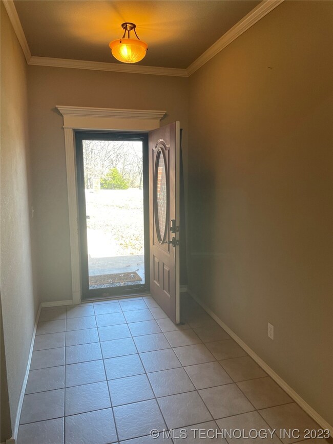 View from living room to front door entryway