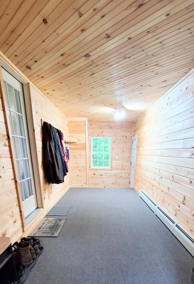5 attached heated mud room