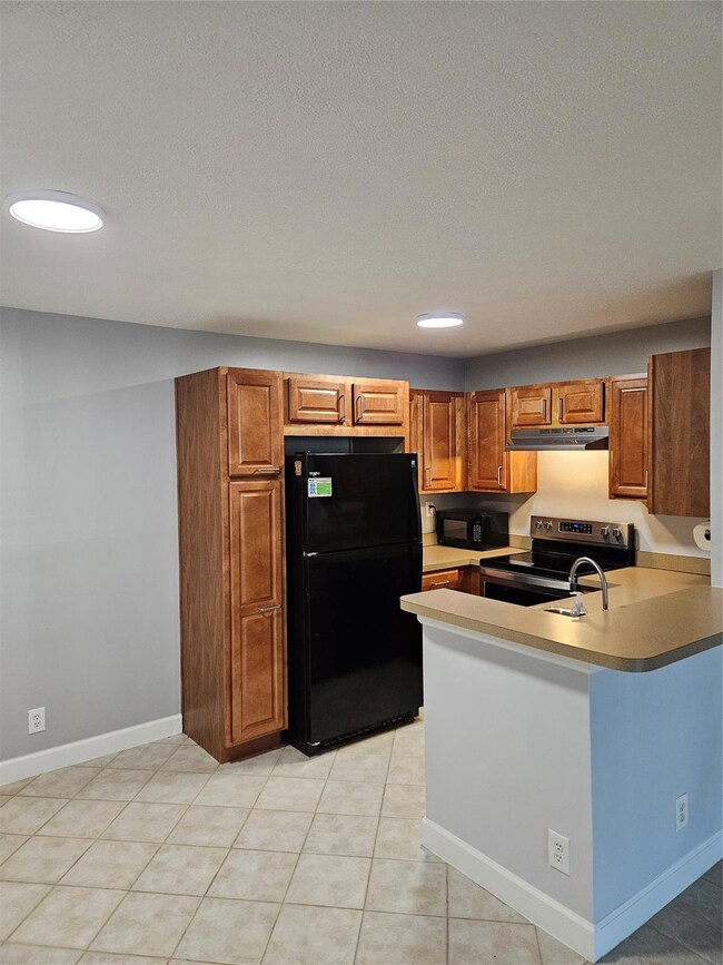 641 Lyons Rd unit 11105, Coconut Creek, FL 33063 - photo 2