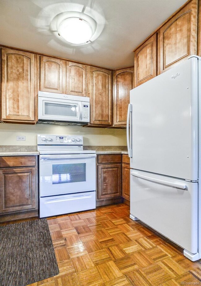 GLASS TOP RANGE.  MICROWAVE AND REGRIGERATOR