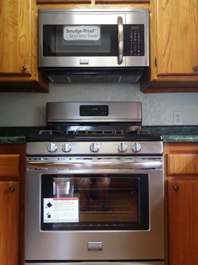 Brand New Stainless Range and Microwave