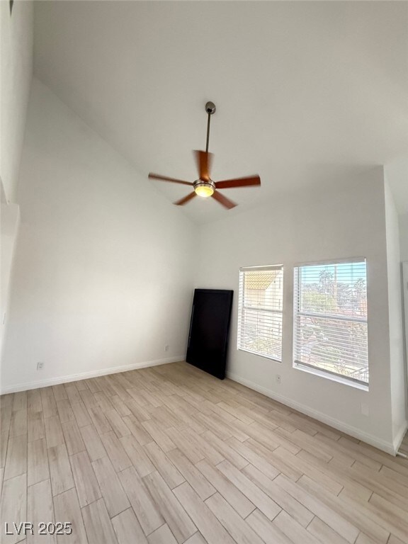 Unfurnished living room with light wood-style floo