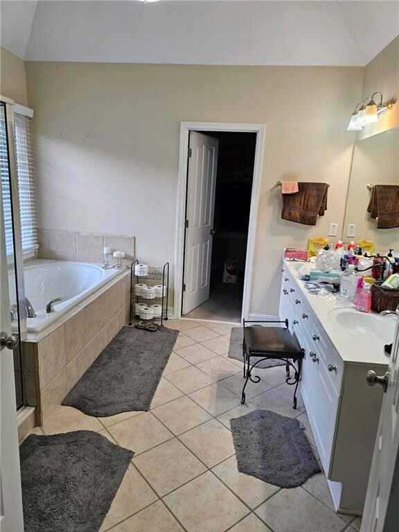 Bathroom with shower with separate bathtub, vanity