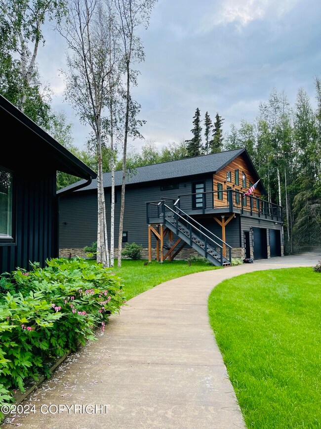 Paved walkway to the mancave