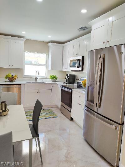 New Kitchen w/ NEW SS Appliances, Can Lighting & I