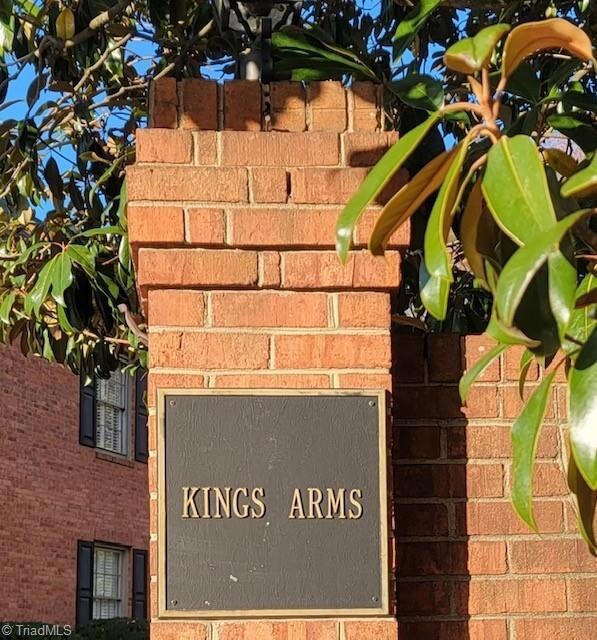 Stately sign at 2nd unit entry across from the post office.