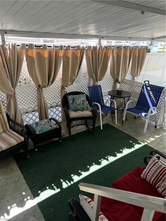 Cozy sitting room under carport