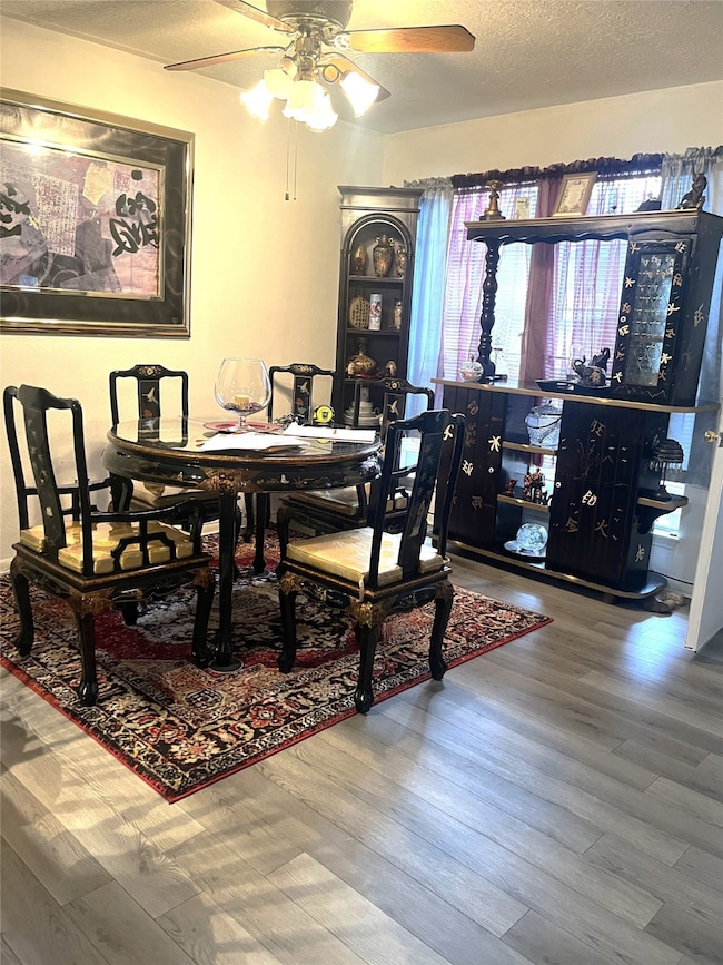 Spacious breakfast/dining area with laminate flooring