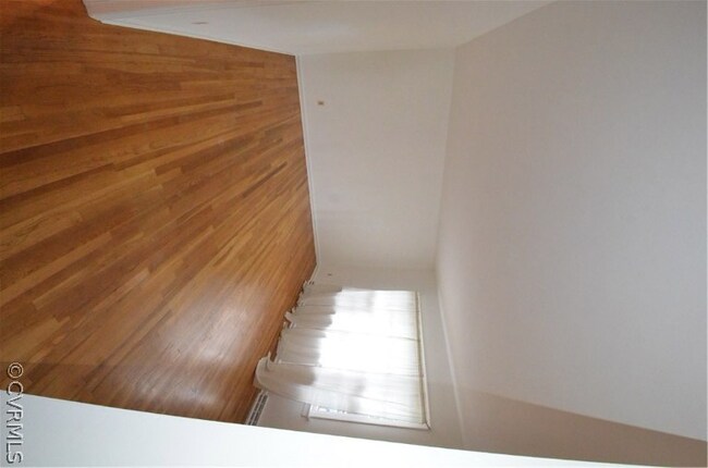 Large living room with hardwood floors