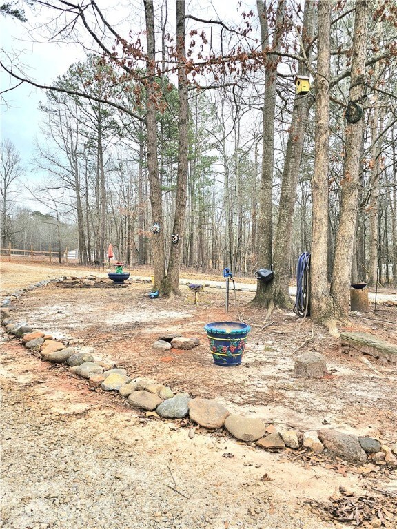 Pretty, level lot with circular drive