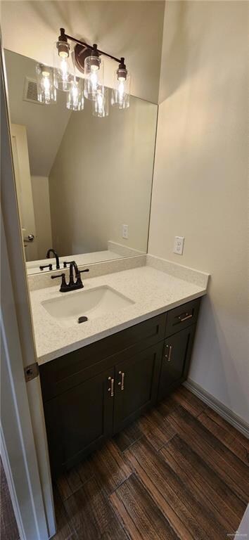 Half bathroom located dowcstairs