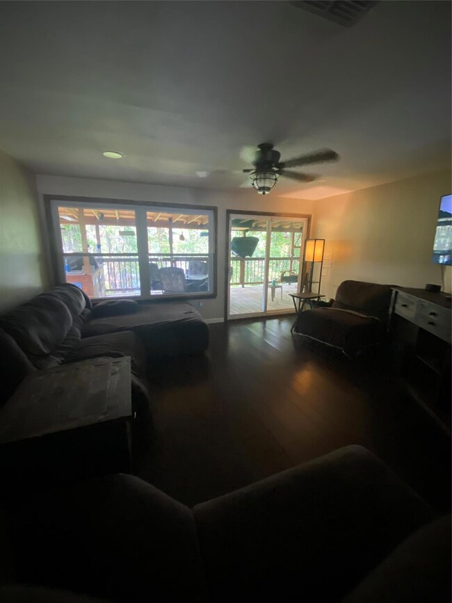 Living room featuring hardwood / wood-style floori
