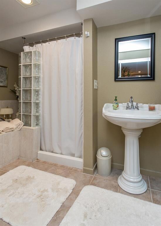 Beautiful bathroom downstairs with jet tub