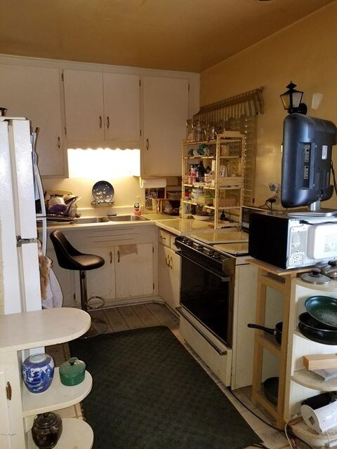 Kitchen with original cabinets