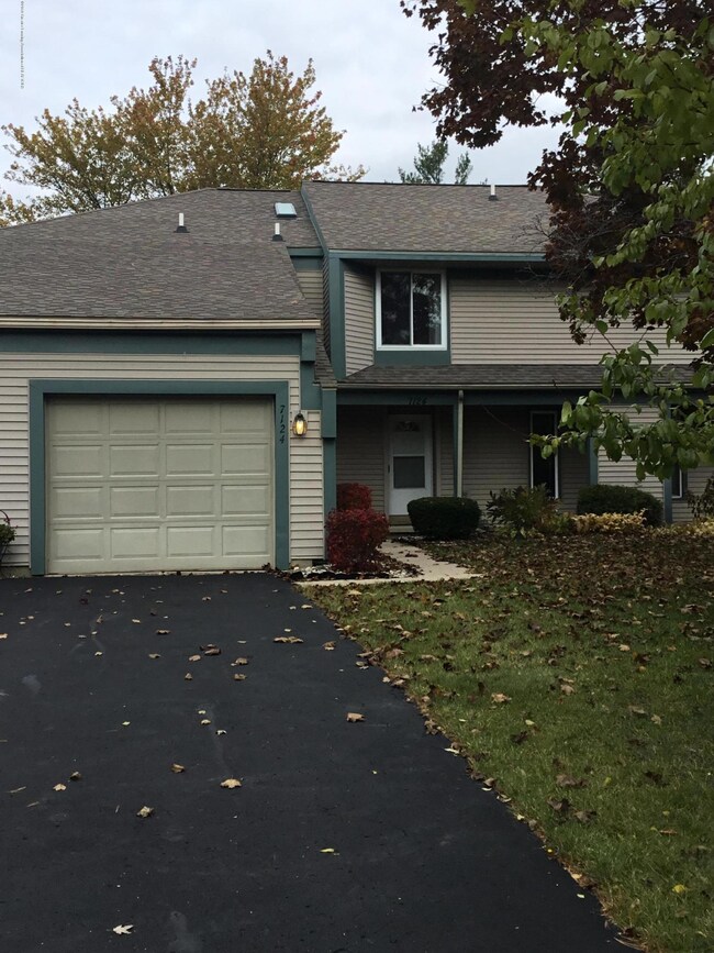 7124 Creekside Dr unit 55, Lansing, MI 48917 - photo 2
