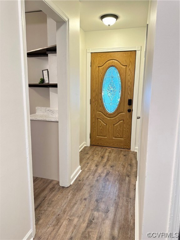 View of wood floored entryway