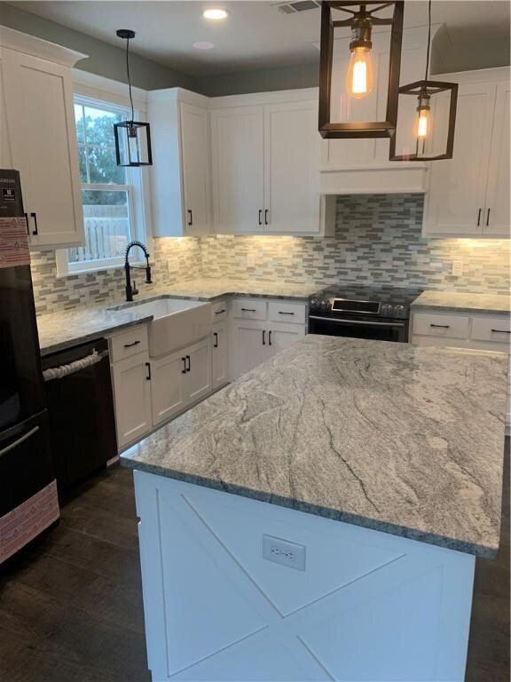 Custom Kitchen featuring farm sink with commercial