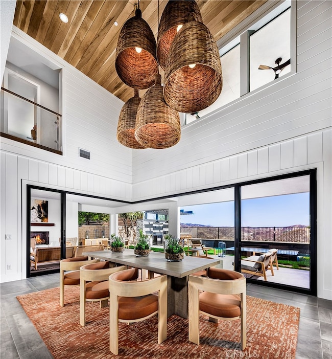 Dining Room to Outdoor Room: Chara - Alta Monte Collection at Tesoro - Photo of Model home.  Not actual home for sale.  Home is still under construction.