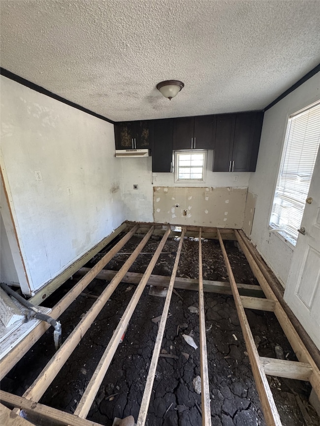 Kitchen featuring a textured ceiling