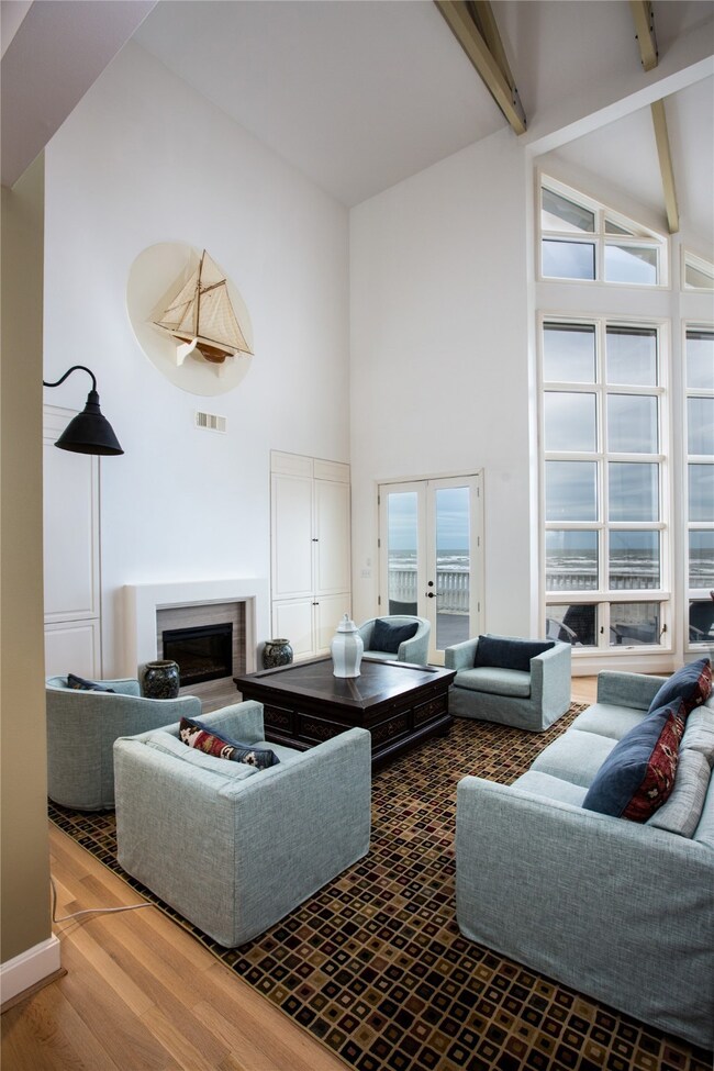 Floor to ceiling windows in the living room captur