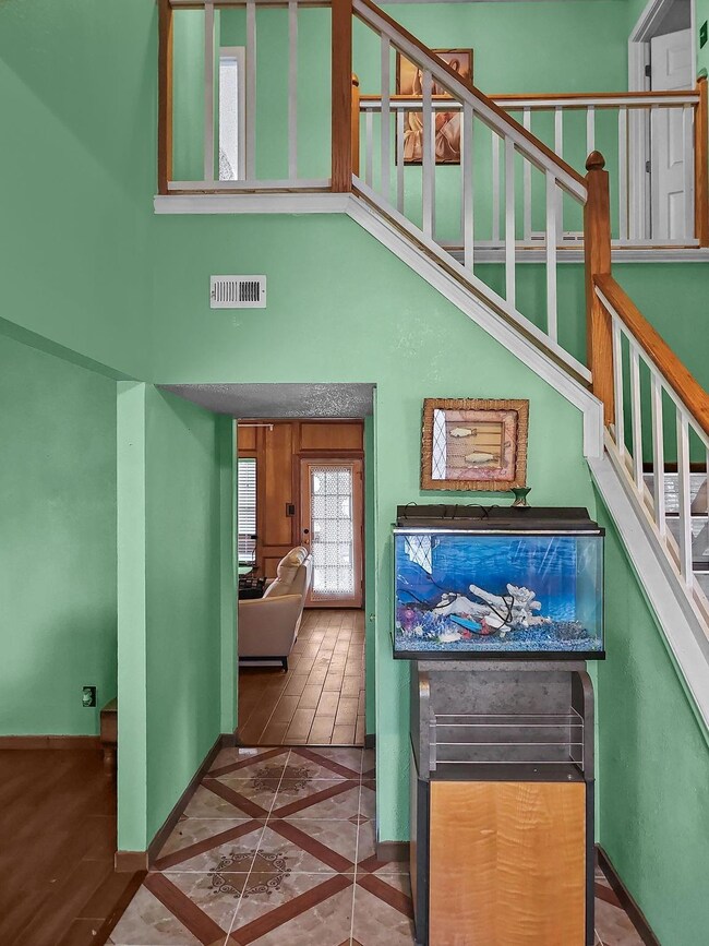 Staircase with a high ceiling