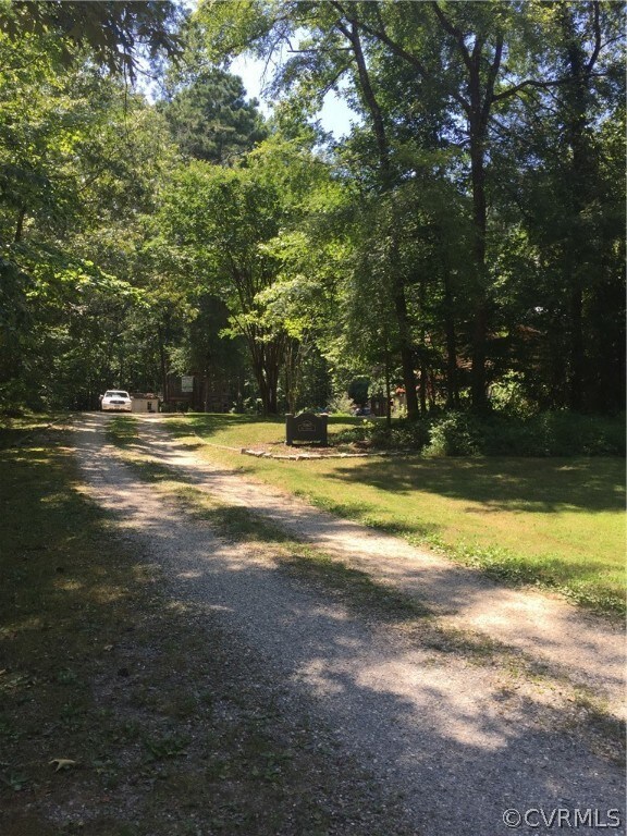 A welcoming entrance to 15462 Journey Ln well off the main road. Do yourself a favor and take a peak inside at the amazing space this home has to offer.