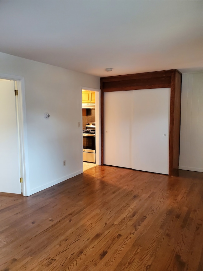 Another view of the living room looking into the kitchen.