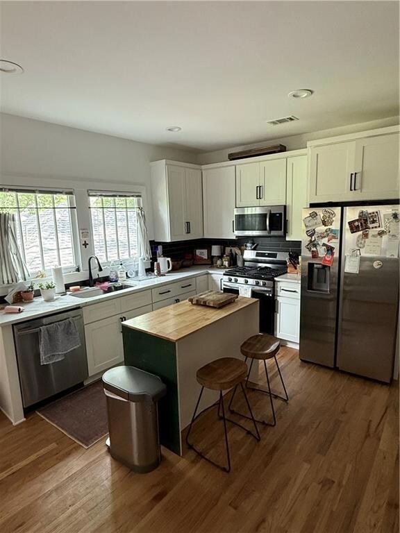 Kitchen island with stainless steel appliances to make your favorite meals and entertain
