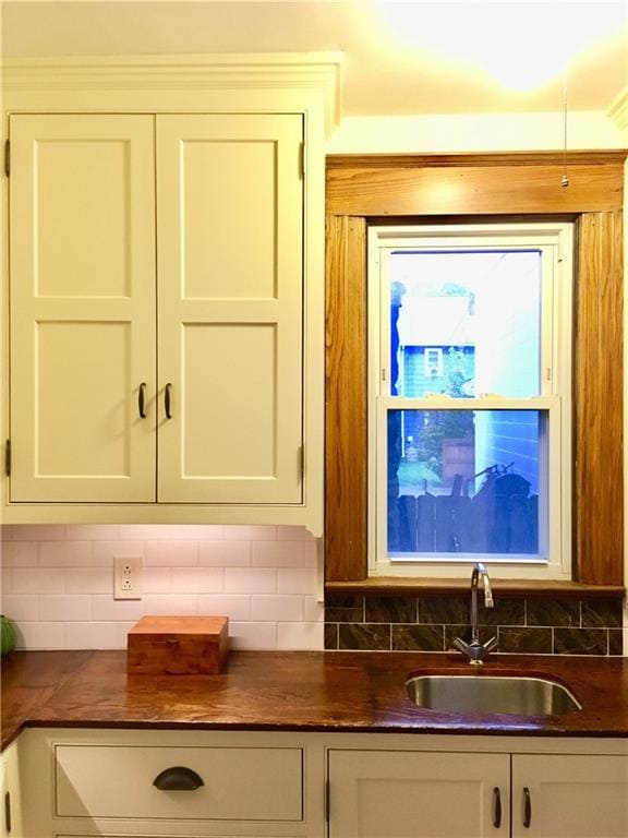 The walk in pantry with wood counters and custom b