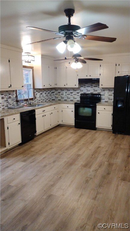 Kitchen featuring light hardwood / wood-style floo