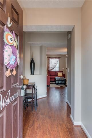 Welcome inside this immaculate 3 BR/2.5 BA Townhome in The Villas at Evergreen Farms. This is the largest floor plan offered in the community w/ upgrades, renovations & extras! Do NOT miss this one!  Just painted entire inside of home!!!    