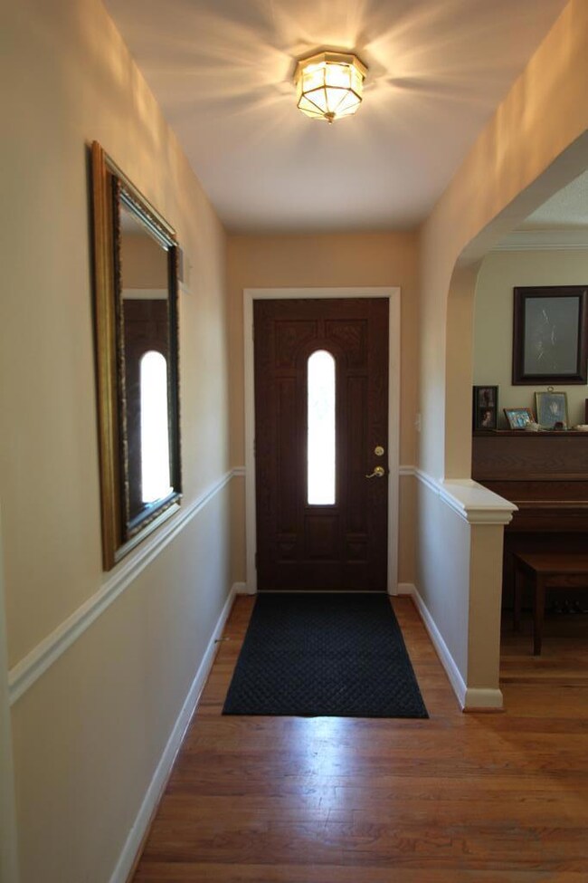Entry with wood floors