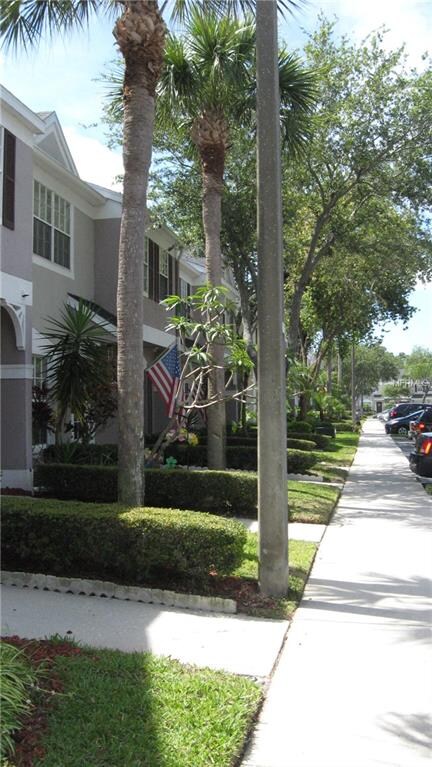 View of sidewalk that runs in front of all units. 