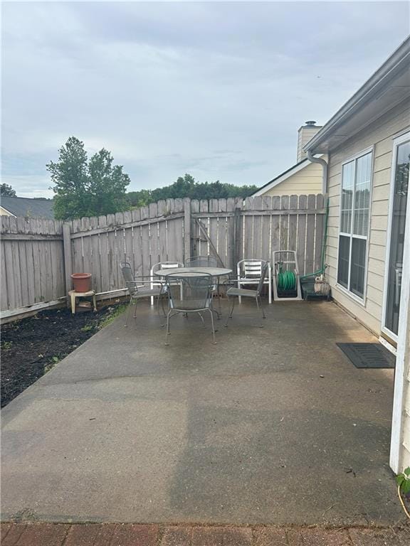 View of patio / terrace with a fenced backyard