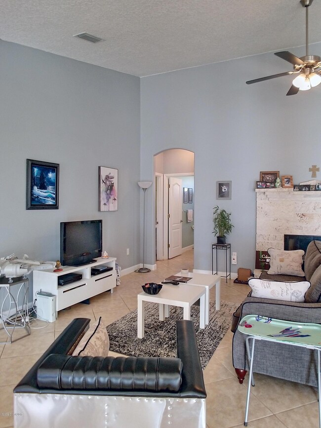 Spacious Living Room with Fireplace