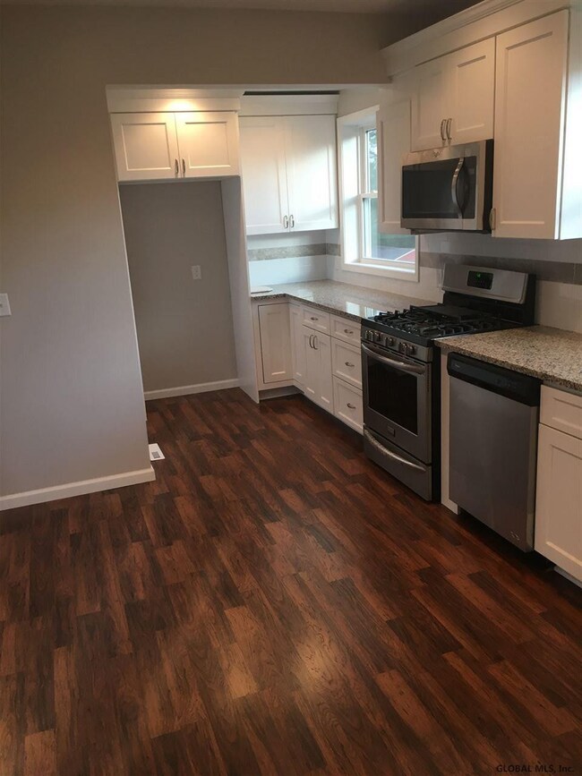 Crown trim and subway tile backsplash