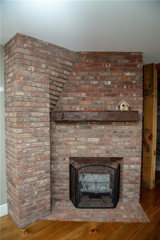 Wood burning fireplace in kitchen.