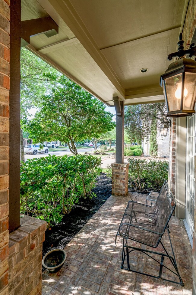 A charming front porch is the perfect spot to sit and have a cool beverage on hot summer's night and a place to visit with neighbors as they pass by on an evening stroll!
