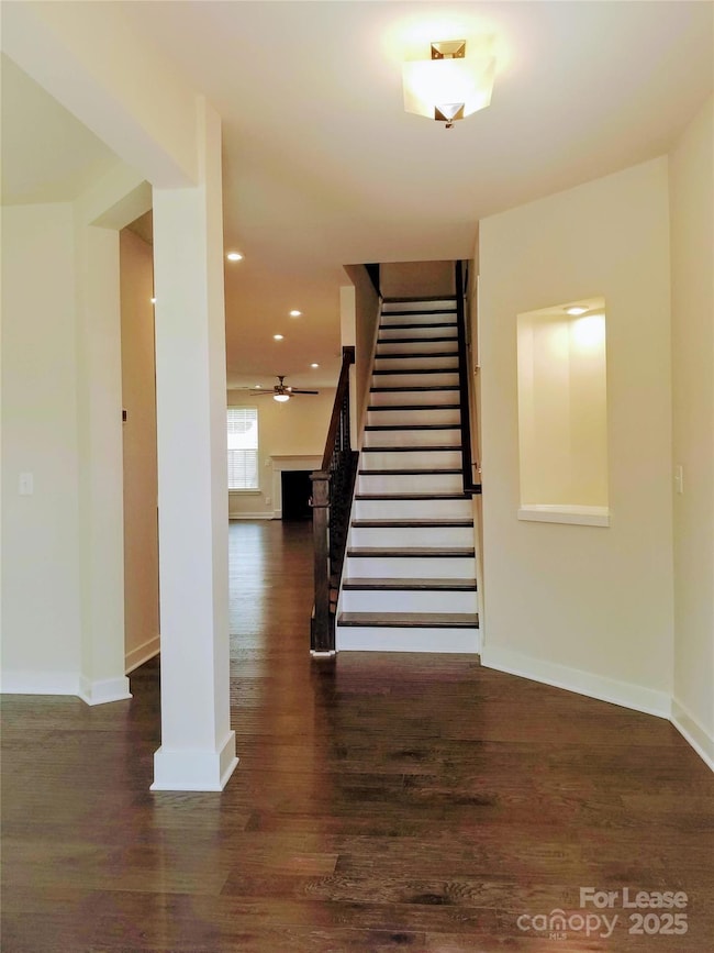 Entrance foyer with lighted showcase.