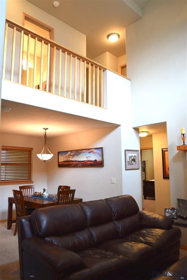 Living room with vaulted ceilings