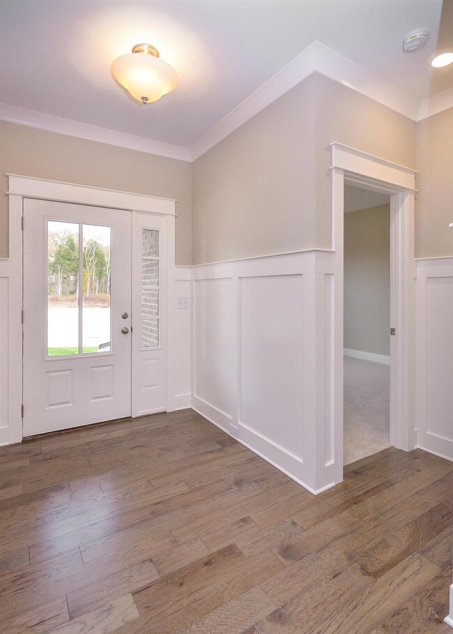 Judges paneled Foyer with Craftsman Trim throughout!  BTW the only room upstairs is the Bonus Room!  One level living that feels massive!