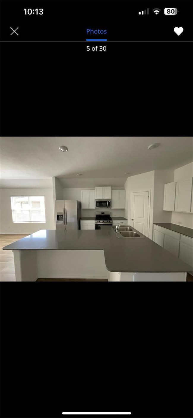 Kitchen featuring appliances with stainless steel