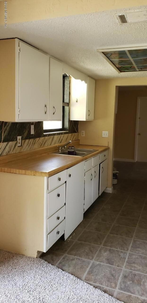 6984 Autrey Ave E, Jacksonville, FL 32210 - photo 5