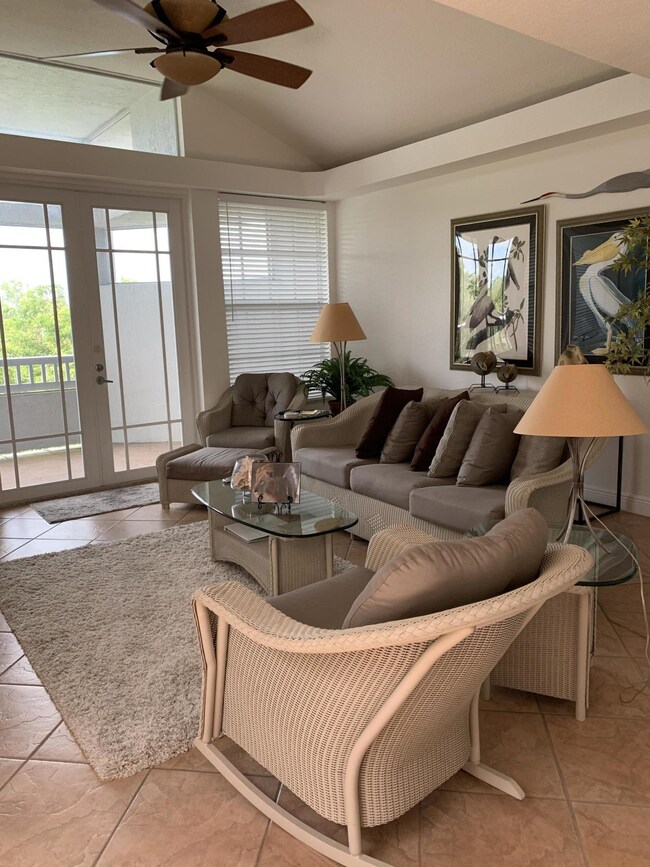 Living Room with screened balcony