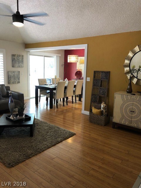 Enter into oversized family room with vaulted ceil