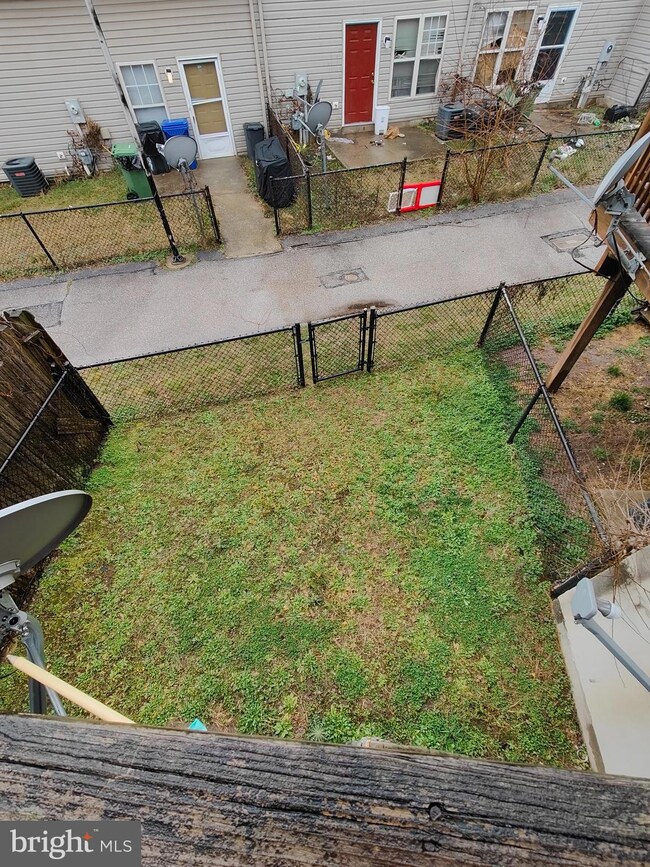 772 Dr Benjamin Quarles Place, Baltimore, MD 21201 - photo 2