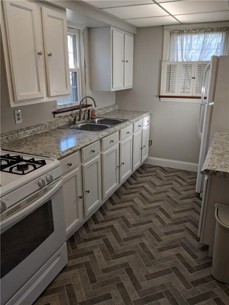 Brand New Kitchen cabinets, flooring and counter t