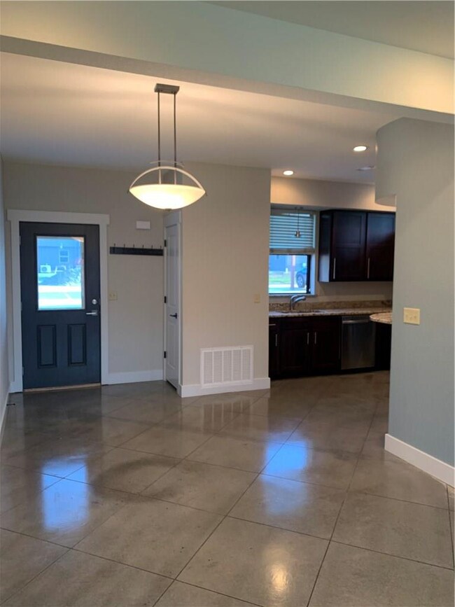 Entry, dining room and kitchen view from living room.