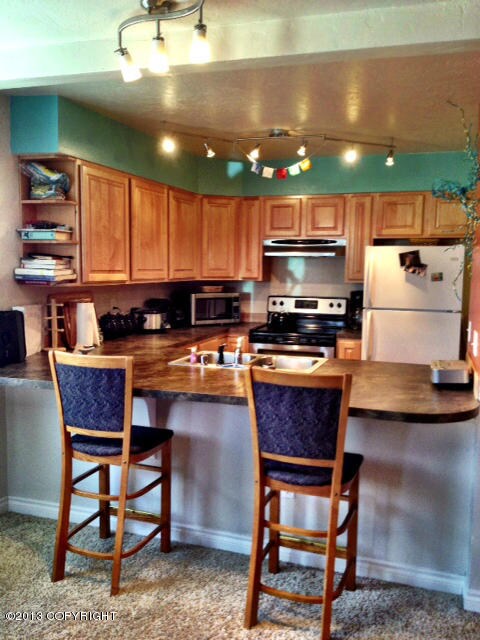 Open kitchen with breakfast bar